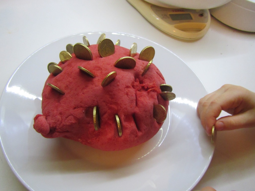 Red coloured salt dough with gold coins - then let the imagination rein...
